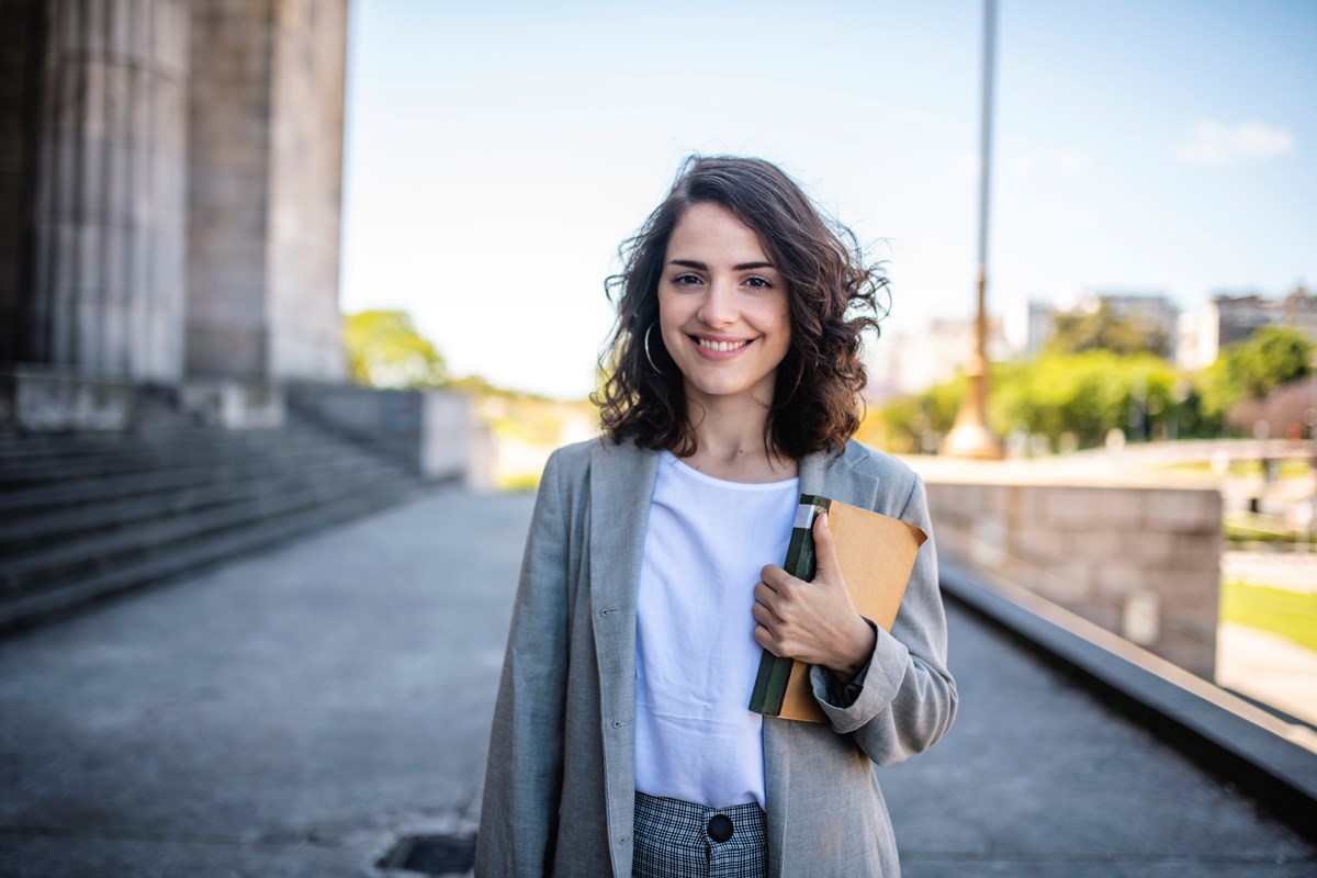 Woman holding book